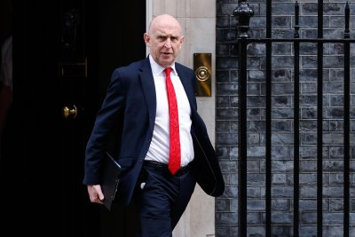 UK defense secretary resigns in protest over military spending