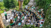 Pomladni koncert Godbe Stična na Lavričevi koči