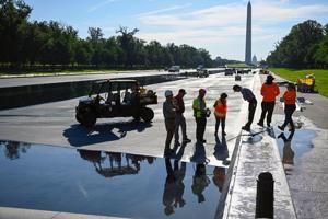 Refilling starts for newly painted Reflecting Pool in Washington, in photos